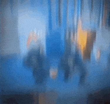 a blurry picture of a blue background with a few lines in it