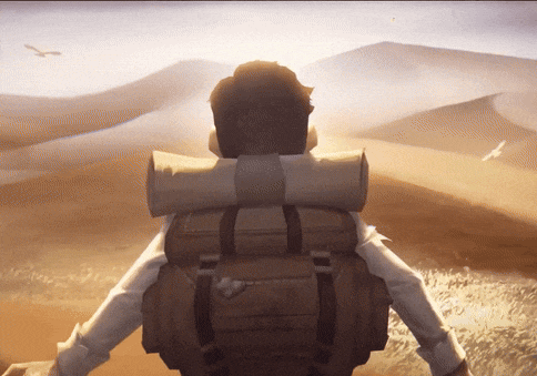 a man with a backpack stands in the desert