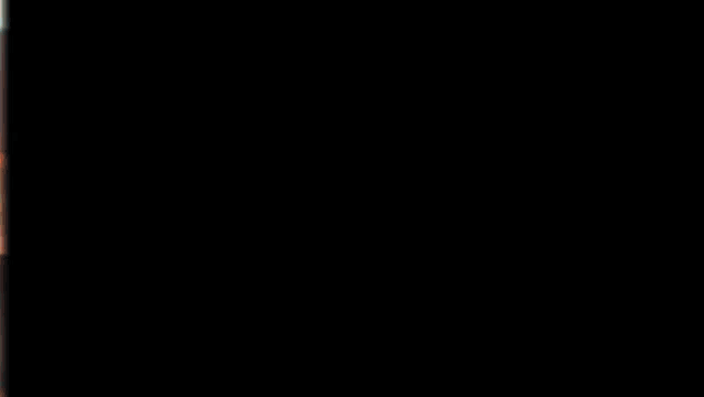 a blurry picture of a person 's face with a dark background