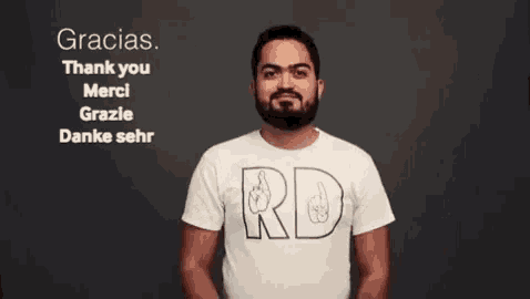 a man with a beard is wearing a t-shirt that says rd on it