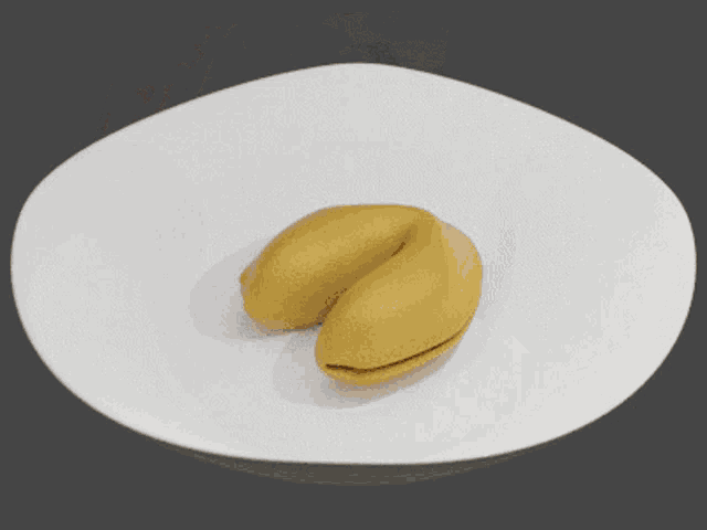a fortune cookie with a picture of a person on it