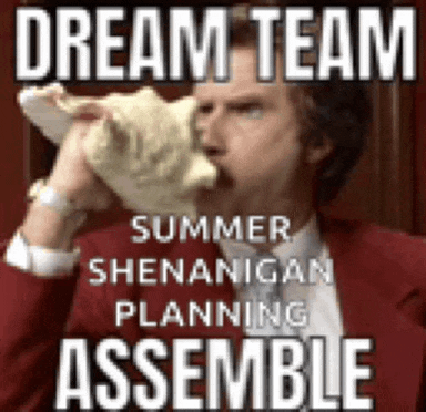 a man in a suit and tie is blowing a sea shell into his mouth ..