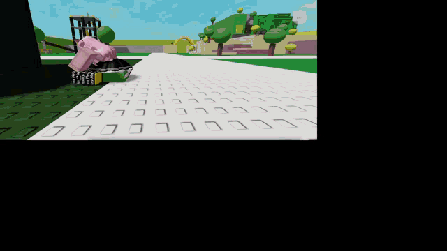 a girl in a pink shirt sits on a white tile floor in a video game