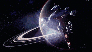 a planet with rings around it and a space ship in the background