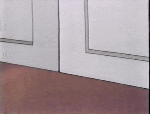 a cartoon character is standing next to a door wearing striped socks and blue shoes .
