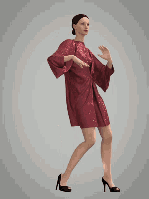 a woman in a red dress and black heels dancing
