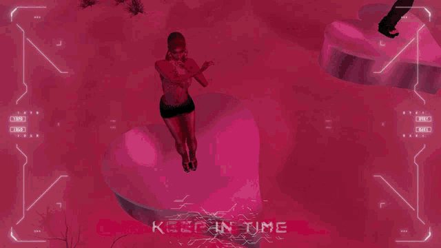 a woman is standing on a pink heart with the words " young world " on the screen