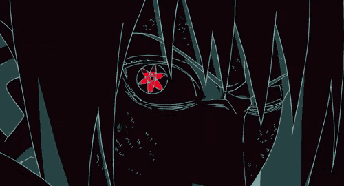 a close up of a person 's face with a red star in their eye