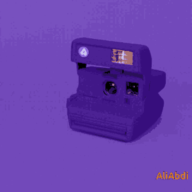 a pixel art of a polaroid camera with the word yas on it