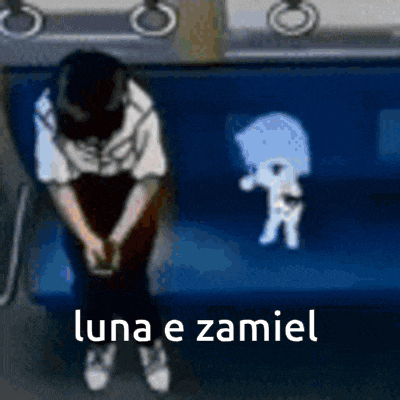 a person is sitting on a blue couch with the words luna e zamiel written on the bottom