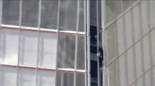 Protesters In London Climbs The Tallest Building GIF - Building London Protesters GIFs