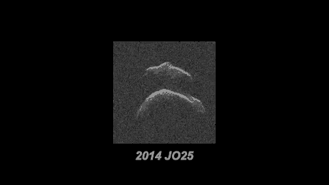 a black and white image of an asteroid with the year 2014 on it
