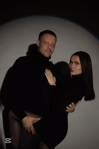 a man and a woman are posing for a picture and the man 's name is klayd and the woman 's is bonni