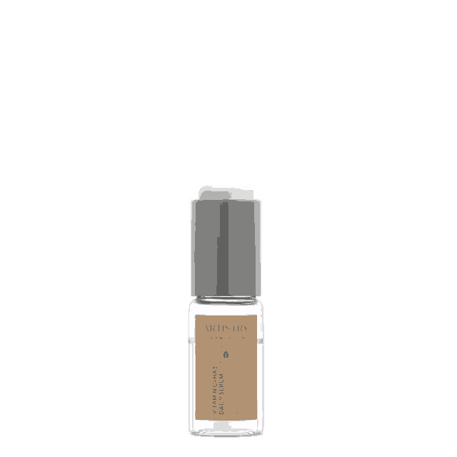 a bottle of artistry daily serum is being opened