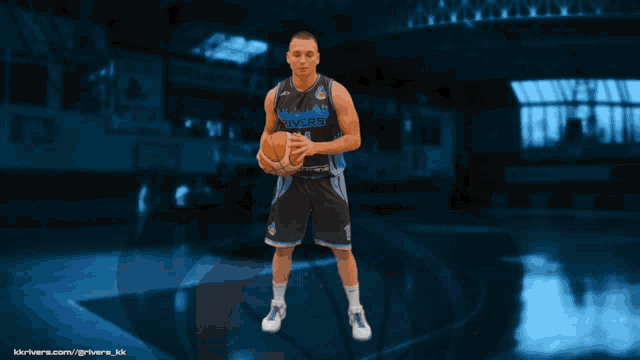 a basketball player wearing a number 14 jersey