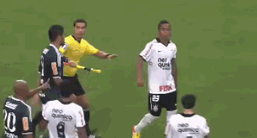a group of soccer players with neo quimico on their backs