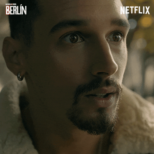 a close up of a man 's face with netflix written on the bottom