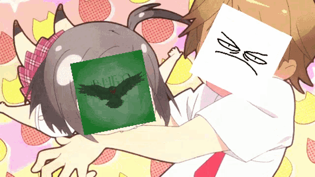a girl is being held by a boy with a picture of a bird on her head that says eagle