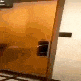 a close up of a door with a black handle on it