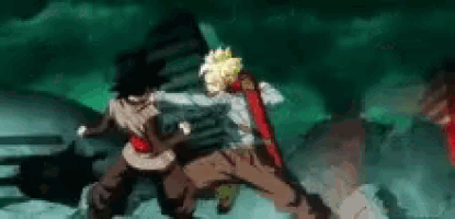a couple of people are fighting each other in a dark room .