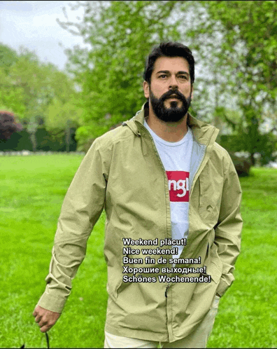 a man with a beard wearing a t-shirt that says ing