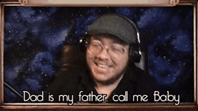 a man wearing headphones says dad is my father