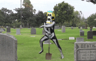 a man in a skeleton costume is digging in a graveyard