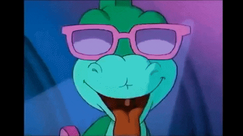 a cartoon dinosaur wearing pink glasses is smiling and sticking out its tongue .
