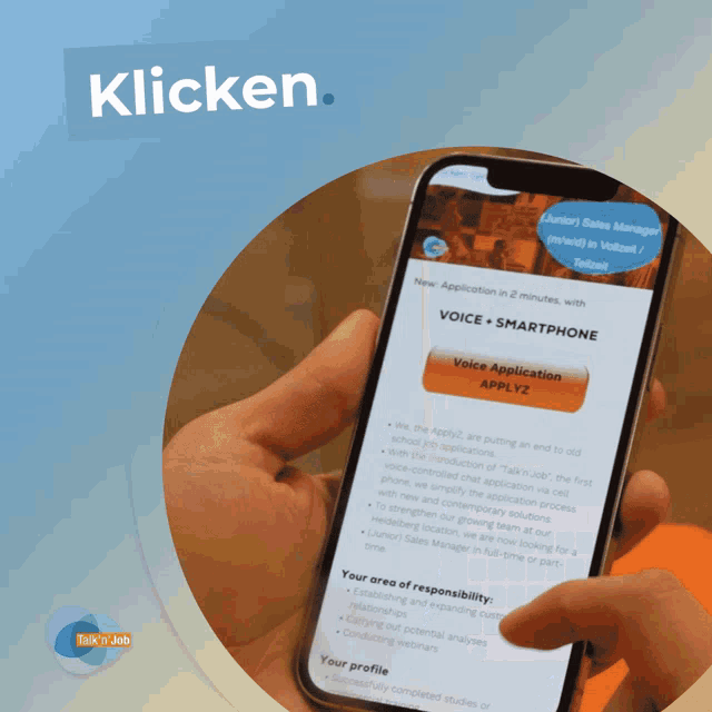 a person is holding a cell phone that says klicken on the bottom