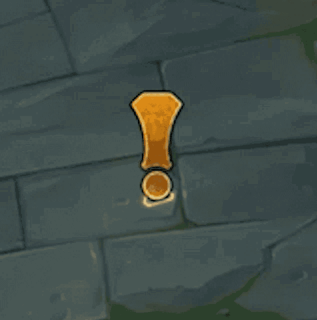 an exclamation point in a triangle on a brick surface