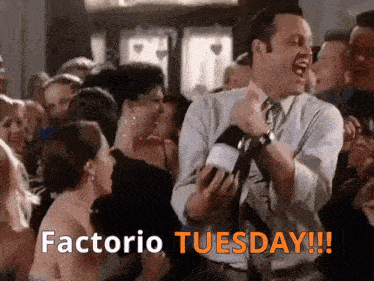 a man in a suit and tie is dancing in a crowd with the words factorio tuesday written on the bottom