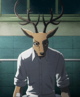 a man with a deer head on his head