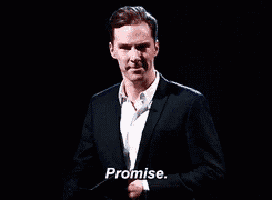 a man in a suit is saying promise in a dark room