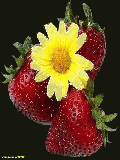 a strawberry with a yellow flower on top of it