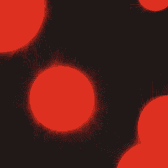 a black background with red circles in the center
