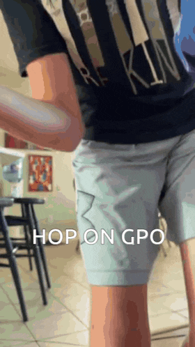 a person wearing shorts that say hop on gpo on them