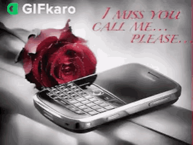 a cell phone with a rose on top of it and the words " i miss you call me please " on the bottom