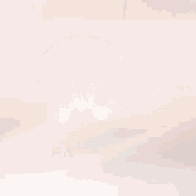 a close up of a person 's face with a blurry background
