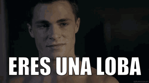 a shirtless man with the words " eres una loba " on the bottom