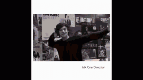 a black and white photo of harry styles with the words " idk one direction " on the bottom