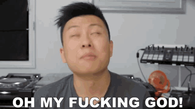 a man is making a funny face and says oh my fucking god