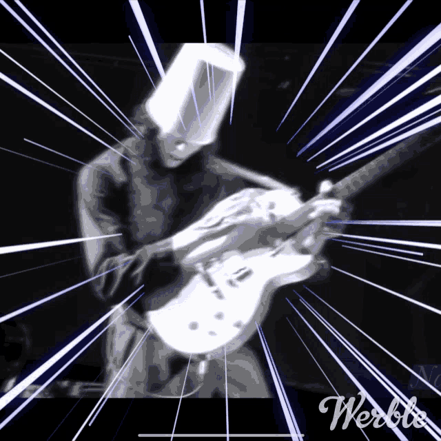 a man wearing a knight 's helmet is playing a white guitar