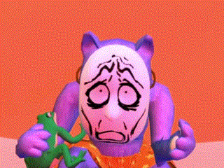 a purple cat with a white mask on its face is holding a green toy frog .