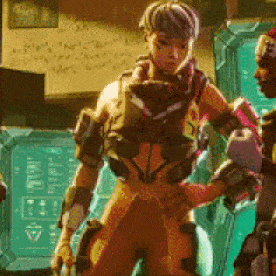 a man in a futuristic suit is standing in front of a wall with a drawing of a heart on it