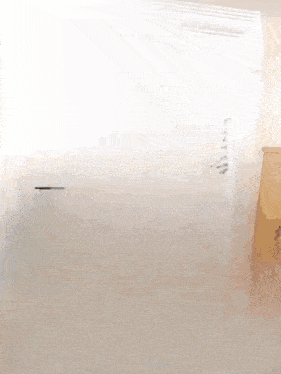 a close up of a white surface with a lot of small dots on it