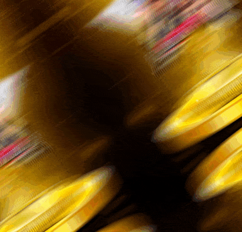 a blurred image of a person riding a ferris wheel