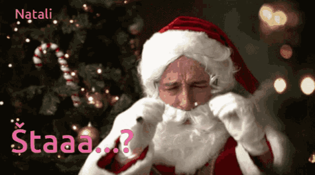 a picture of santa claus with the words natali staaa