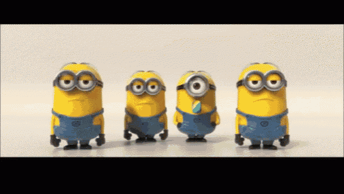 a group of minions are standing in a row with one wearing a tie