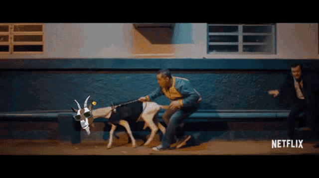 a man is walking a goat on a leash with a netflix logo on the bottom