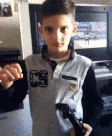 a boy wearing a shirt with the number c9 on the front